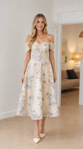 Front view of model wearing Champagne off-shoulder floral embroidered midi dress