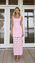 Front view of model wearing pink square neck cutout midi dress