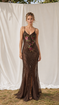Front view of chocolate brown embroidered sequin mermaid maxi dress with spaghetti straps