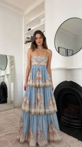 Sky blue floral tiered maxi dress shown from the front