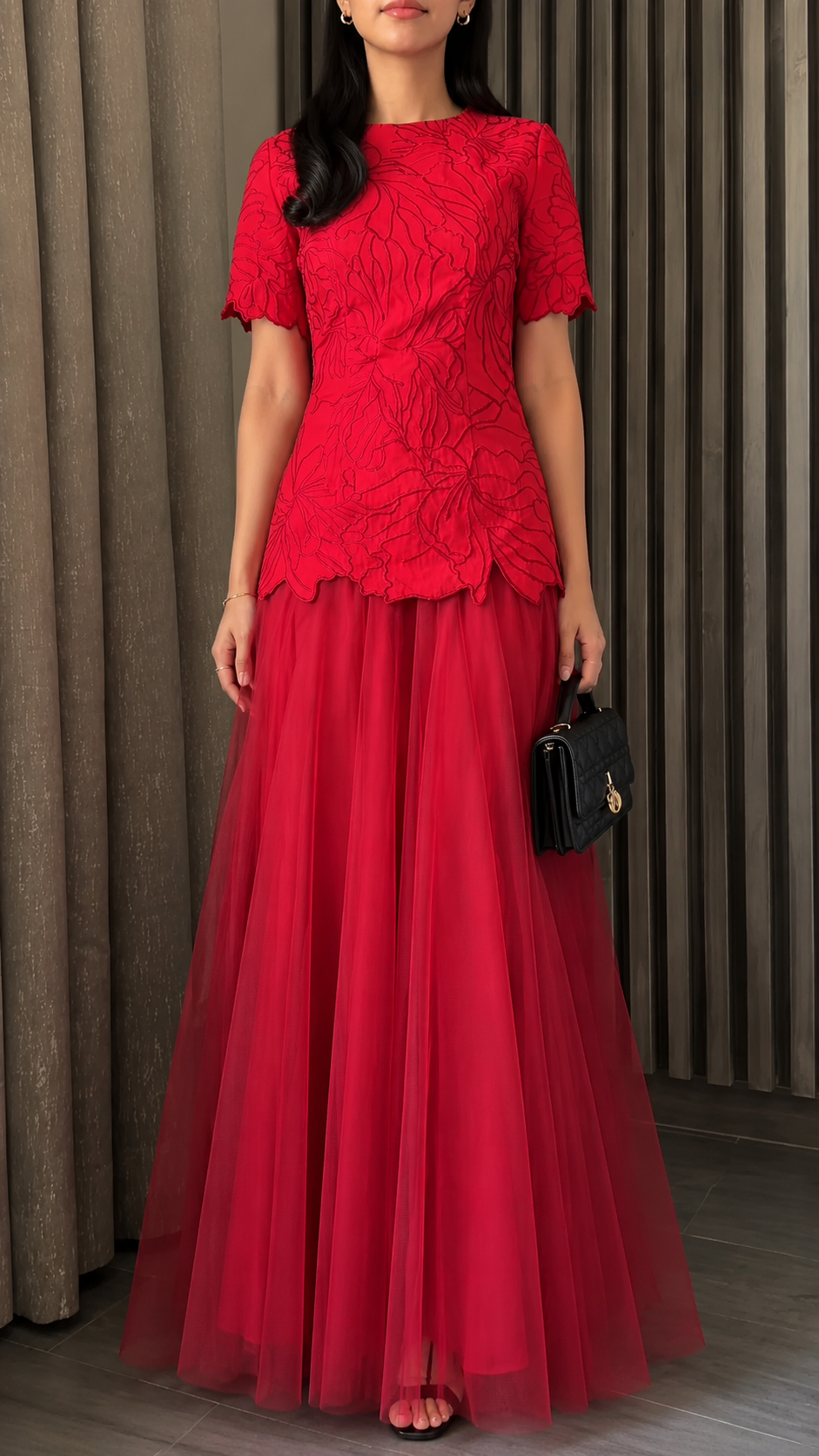Front view of red floral textured short sleeve maxi evening dress with flowing tulle skirt