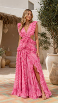 Front view of model wearing pink ruffled cutout maxi dress