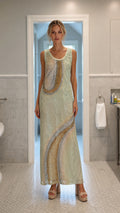 Front view of model wearing mint sequin wave maxi dress