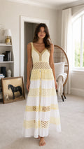 Front view of white tiered crochet maxi dress