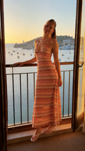 Coral pink zigzag halter neck maxi dress front view