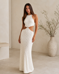 Front view of white textured halter cutout maxi dress