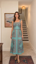 Front view of teal bohemian floral print midi dress