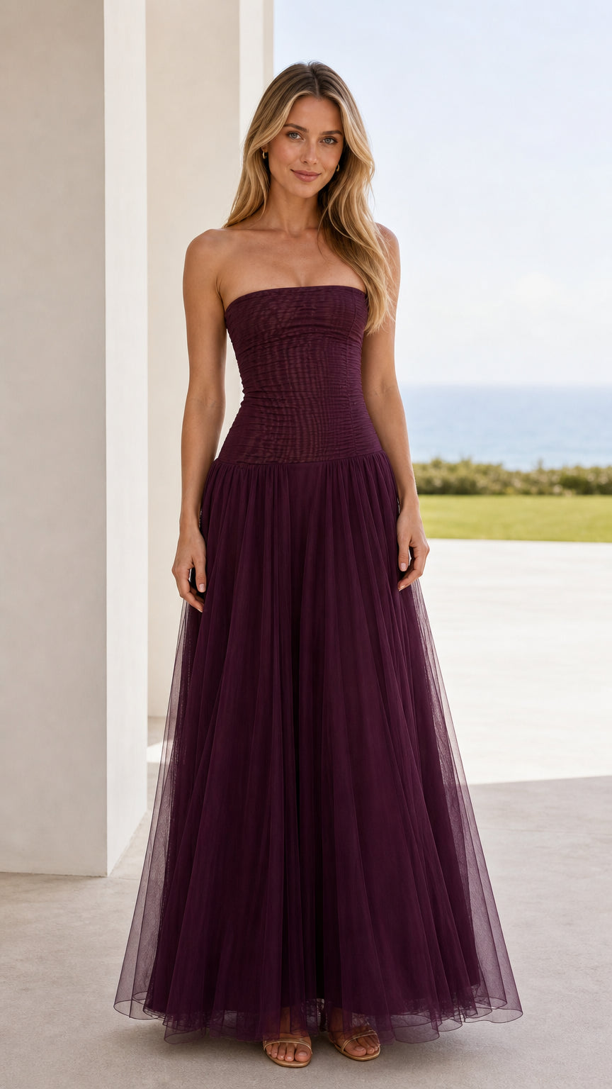 Front view of burgundy strapless ruched tulle maxi dress