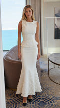 Front view of white 3D floral peplum mermaid maxi dress