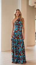 Front view of model wearing rust floral one-shoulder maxi dress