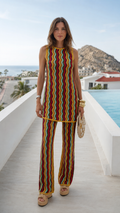 Front view of multicolor wavy textured sleeveless tunic and wide-leg pants set