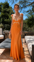 Front view of orange lace trim deep V maxi dress with ruffle straps