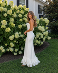 White ruffle trim satin-look mermaid maxi dress side view with flounced hem