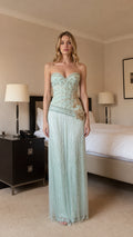 Front view of mint beaded strapless evening dress