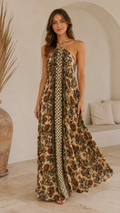 Front view of beige boho halter backless maxi dress with mixed floral print