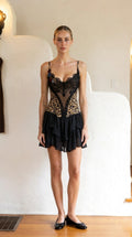 Front view of black lace trim leopard print mini dress