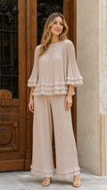 Model wearing beige pleated two-piece set front view