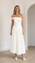 Model wearing white off-shoulder asymmetric pleated midi dress from front