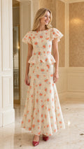 Front view of cream floral print ruffle sleeve peplum maxi dress