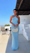 Front view of sky blue halter neck textured maxi dress with chevron knit pattern