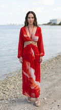 Front view of red abstract print cutout maxi dress