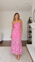 Full front view of model wearing pink floral applique strapless maxi dress