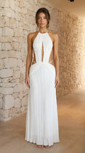 Front view of woman wearing white halter cutout pleated maxi dress
