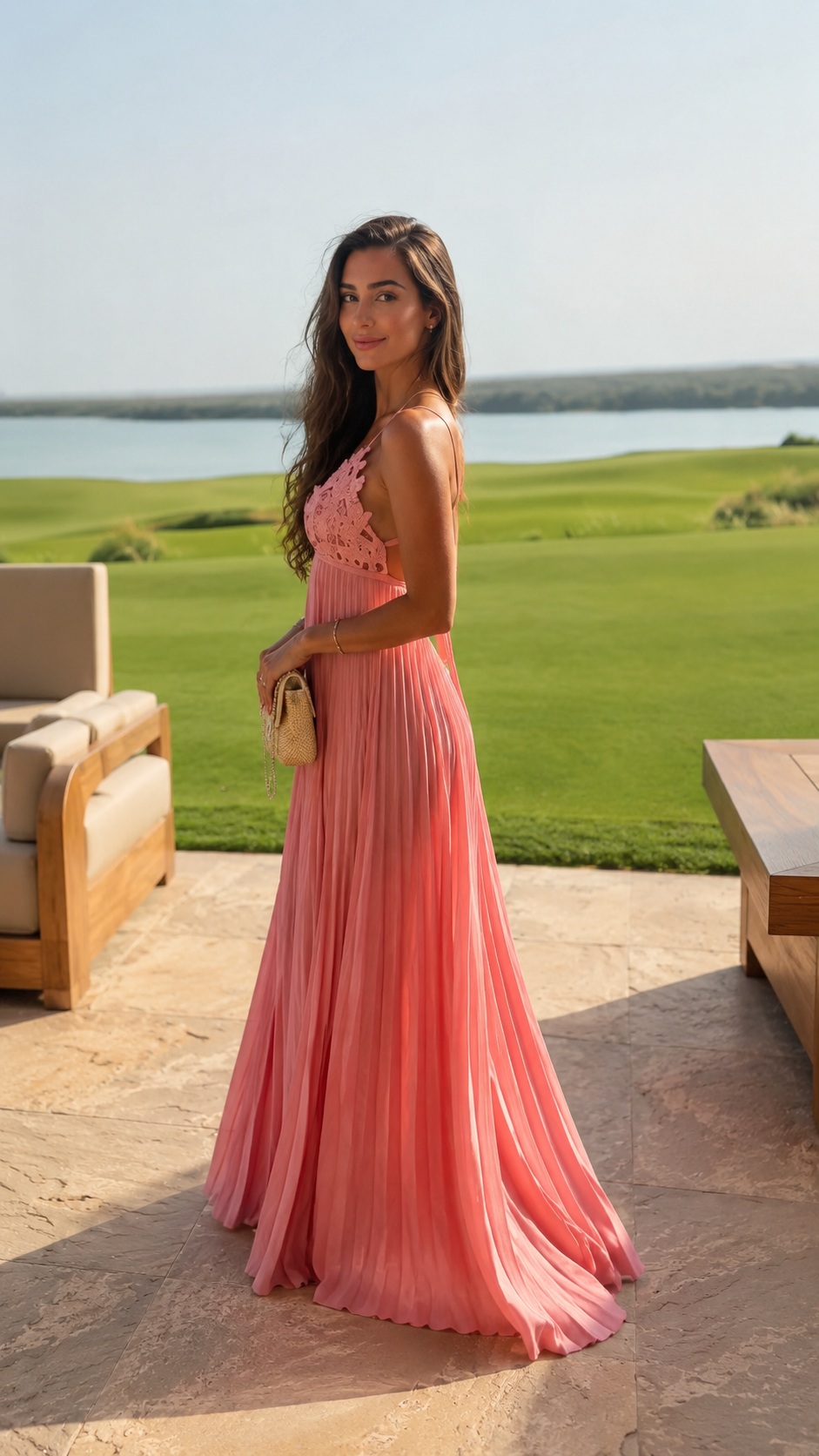 Side view of blush pink pleated maxi dress with lace bodice
