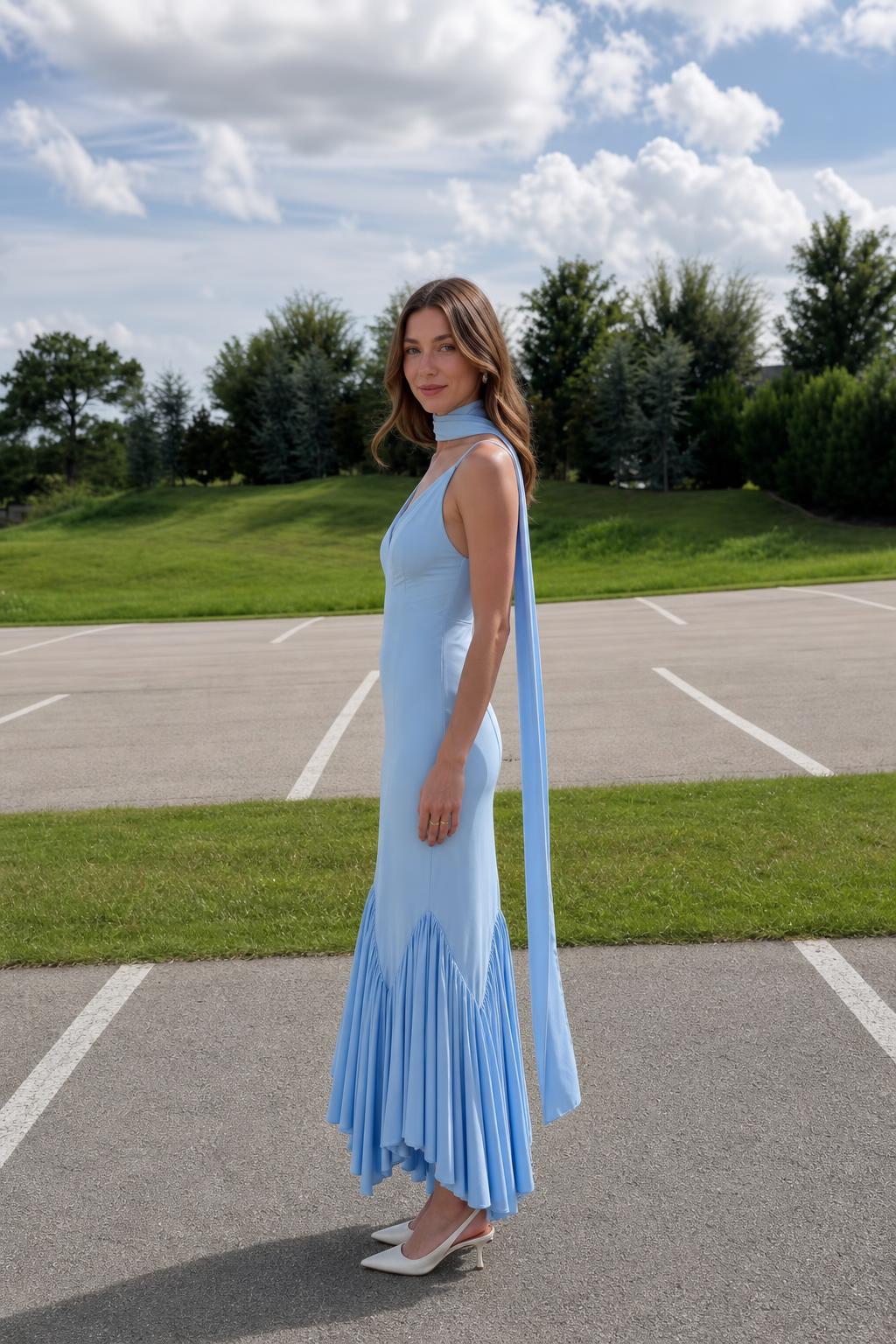 Side profile of light blue maxi dress outdoors