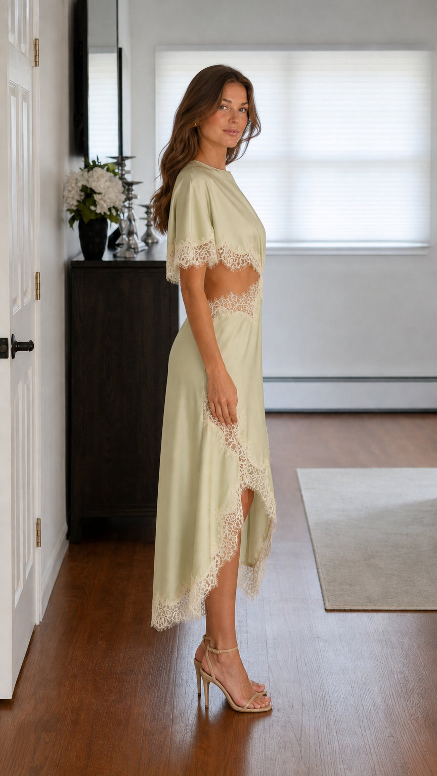 Side profile view of sage satin midi dress
