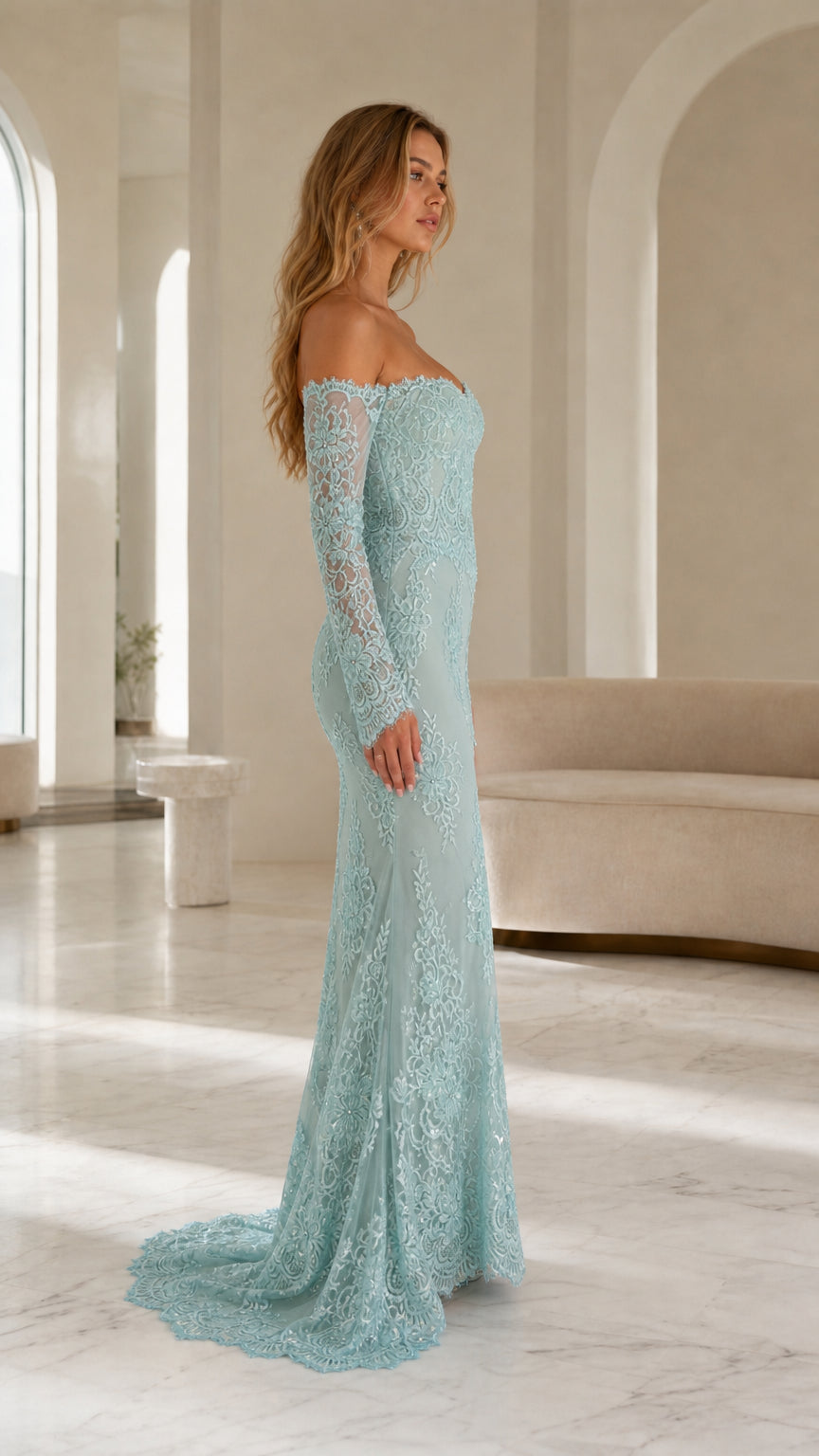 Side profile view of model in sage lace gown
