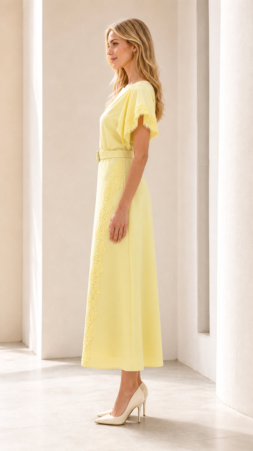 Side profile of yellow midi dress