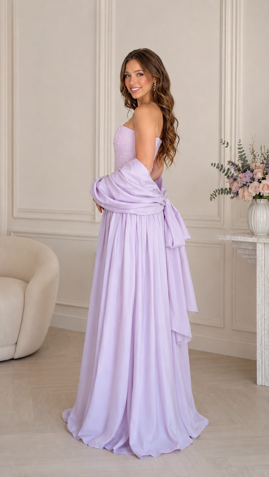 Side view of lavender strapless formal maxi gown with flowing skirt and shawl