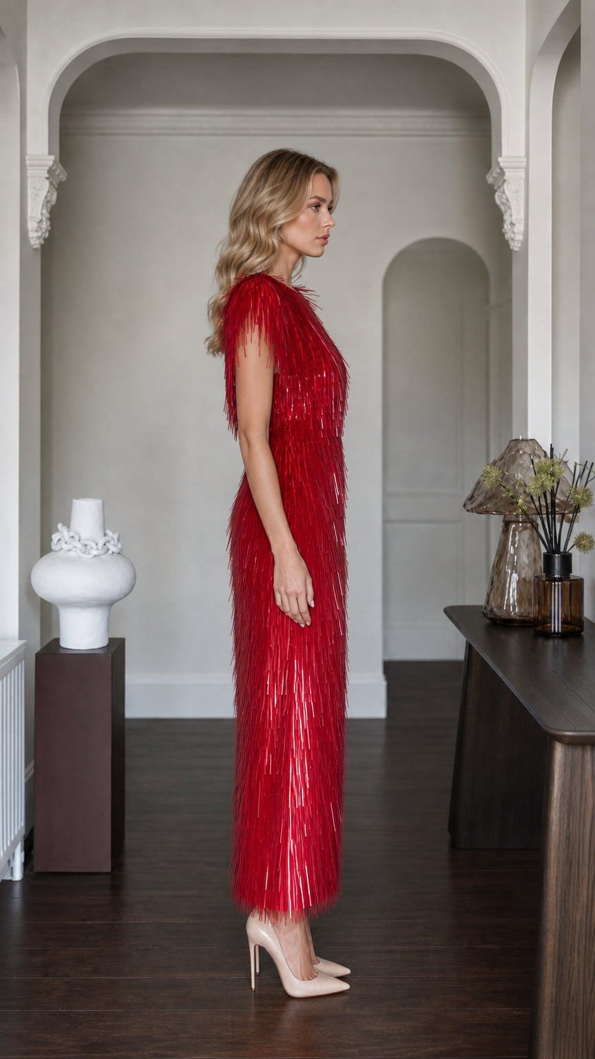 Side profile view of red fringe maxi dress