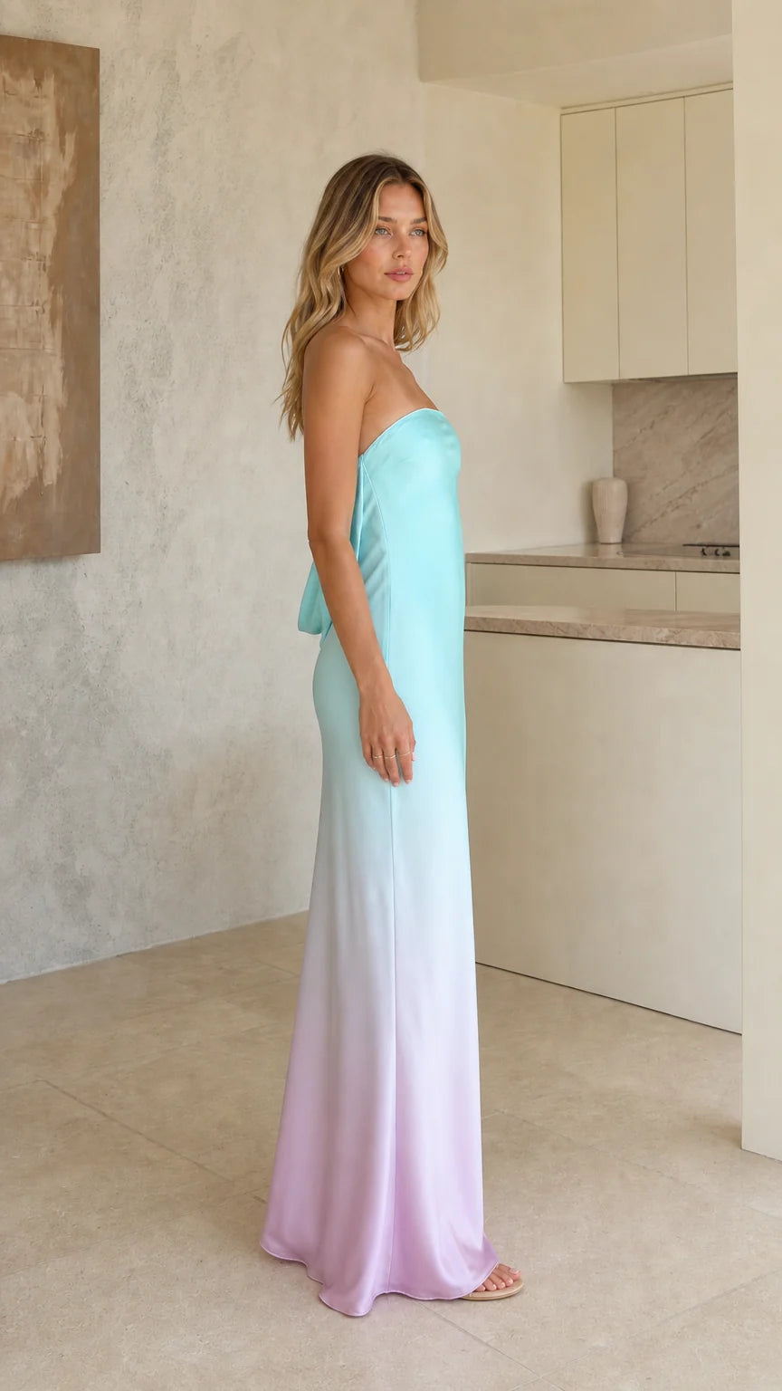 Side profile view of blue and pink ombre satin maxi dress