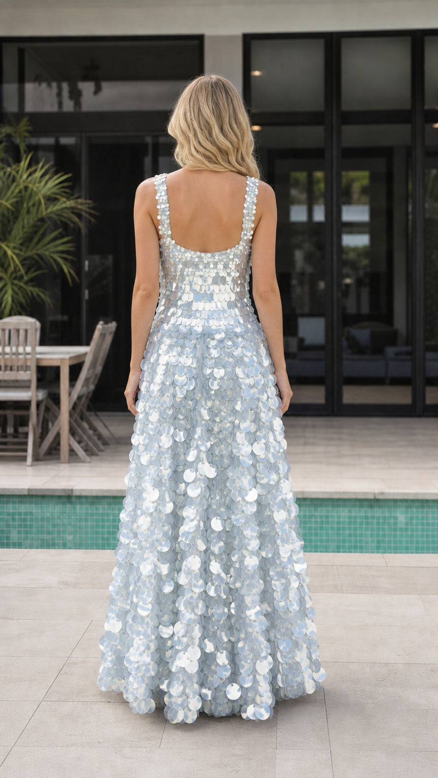 Back view showing the low square back of a silver blue sequin maxi dress
