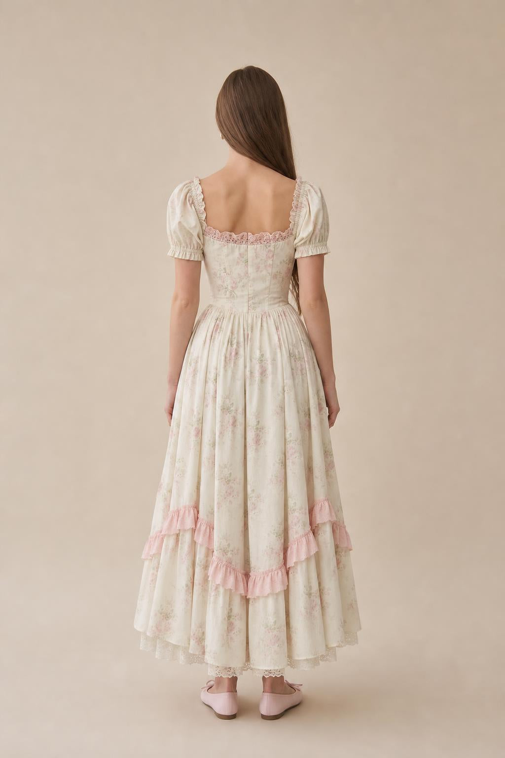 Back view of cream floral corset maxi dress