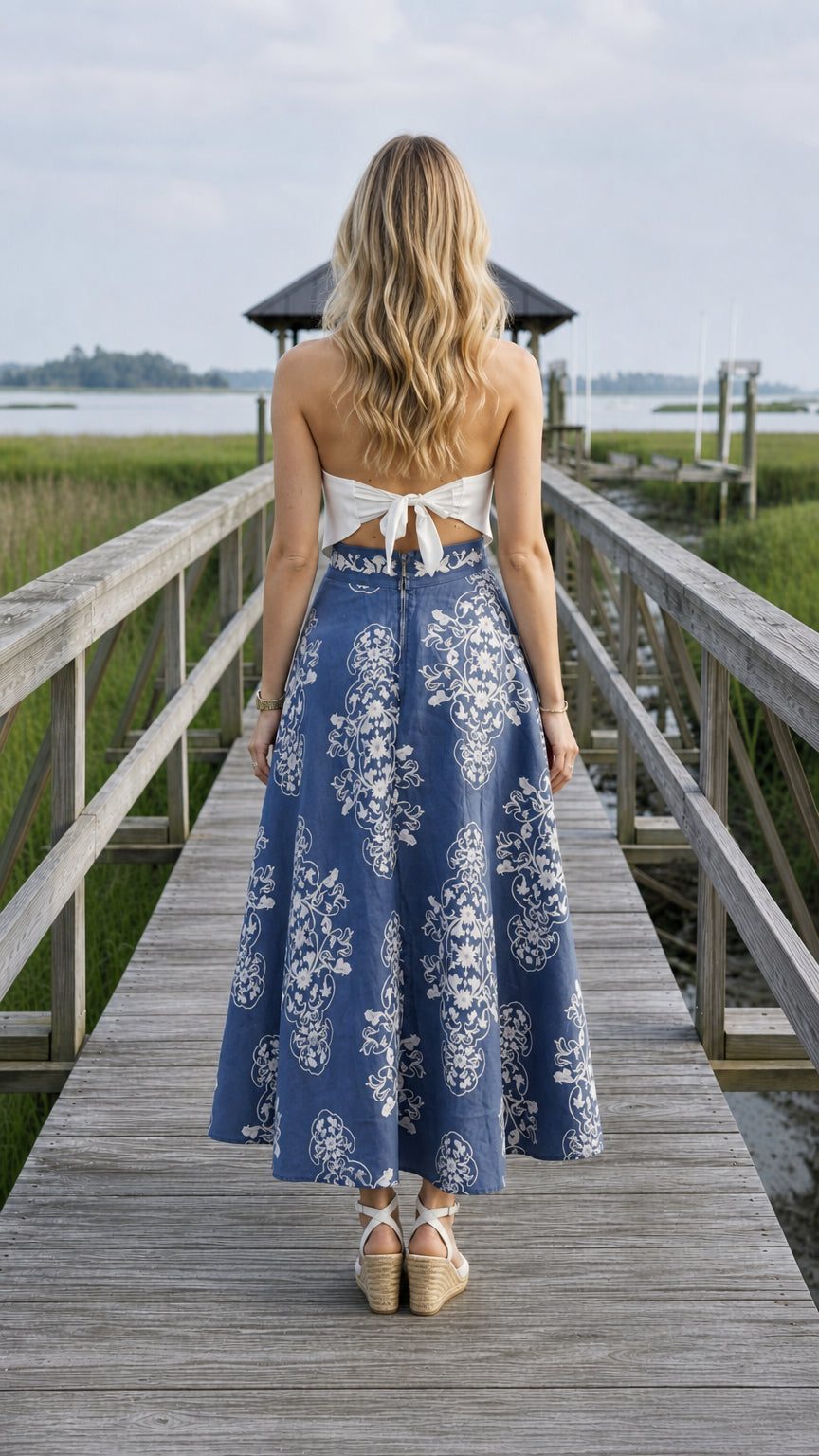 Back view of blue floral midi skirt showing back details