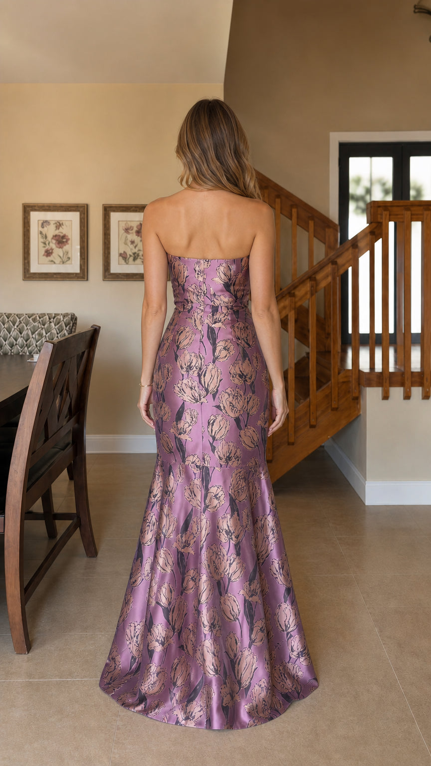 Model wearing purple strapless floral jacquard mermaid evening dress, back view