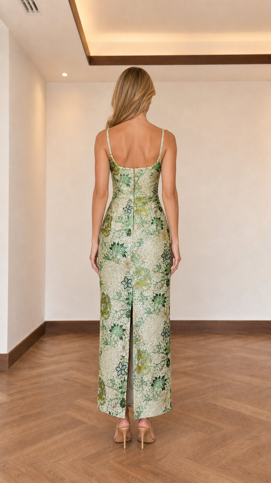 Back view showing back slit detail on sage green maxi dress