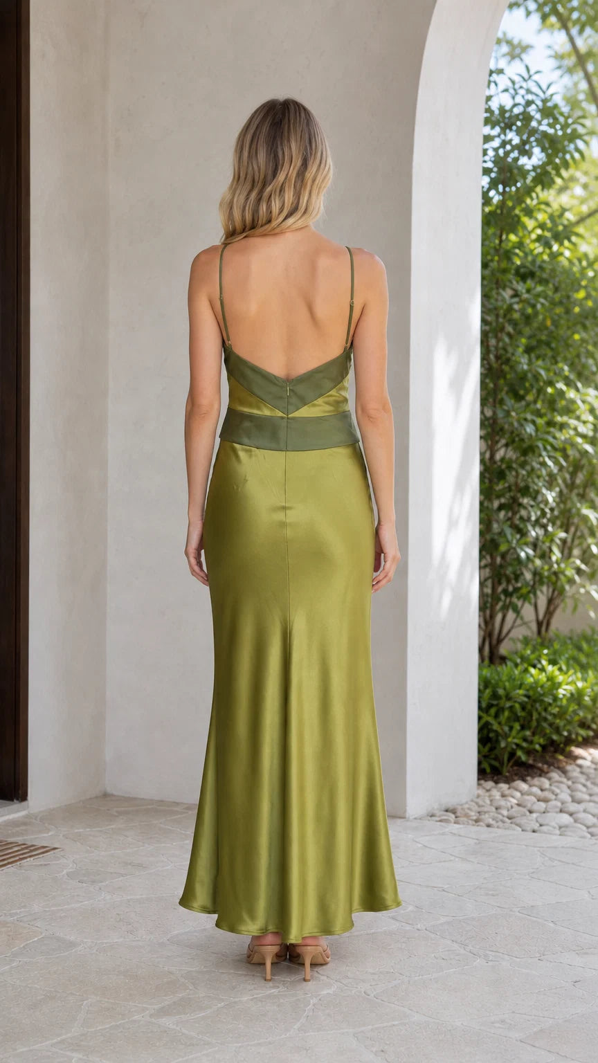 Back view of olive satin halter gown showing open back