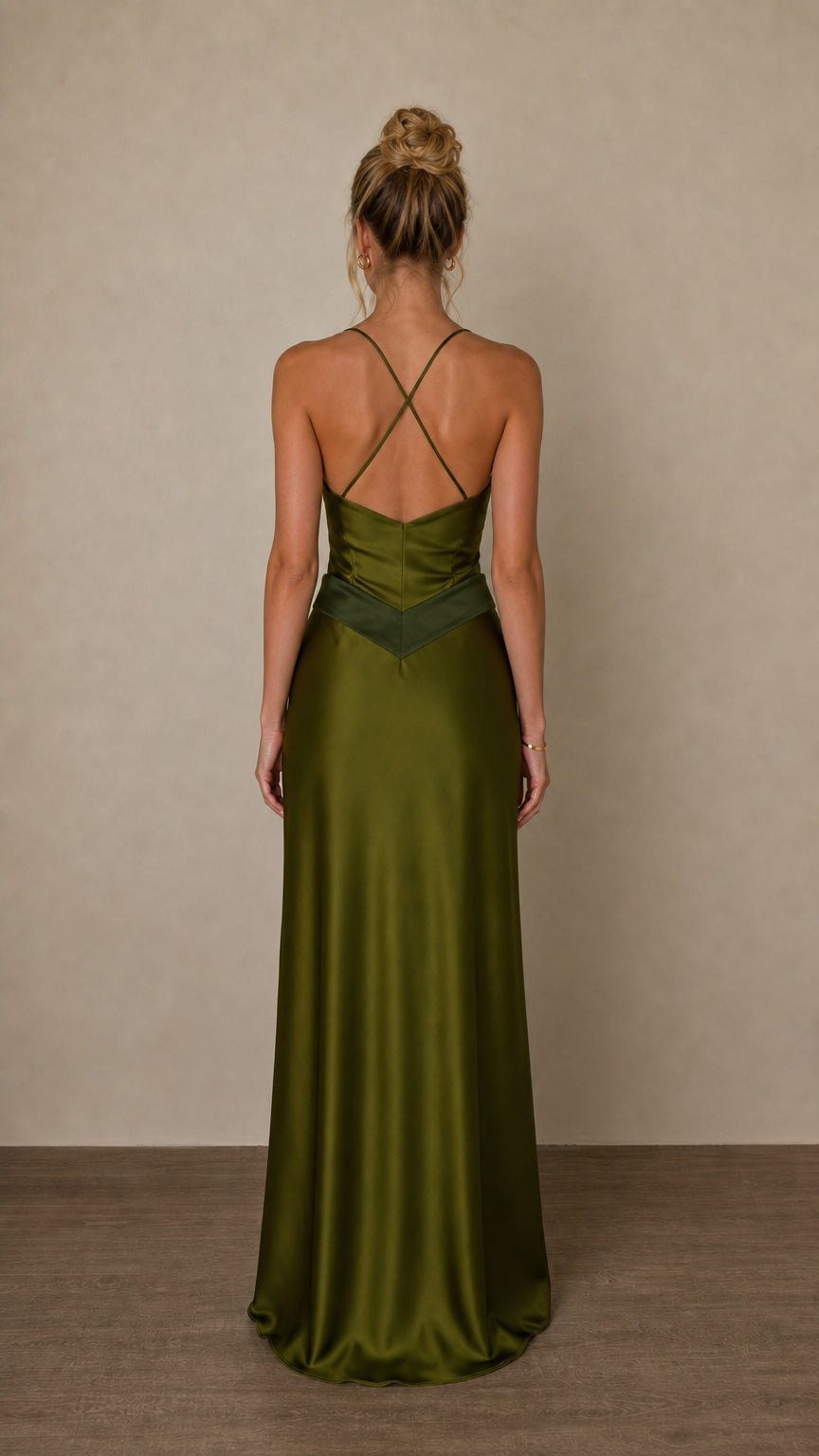 Back view showing criss-cross straps on olive satin dress
