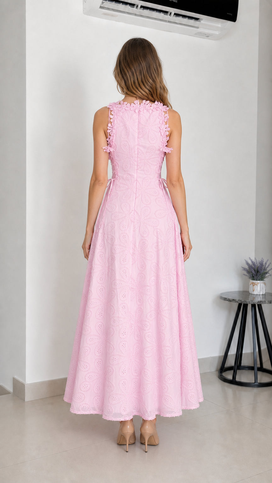 Back view of model in pink maxi dress