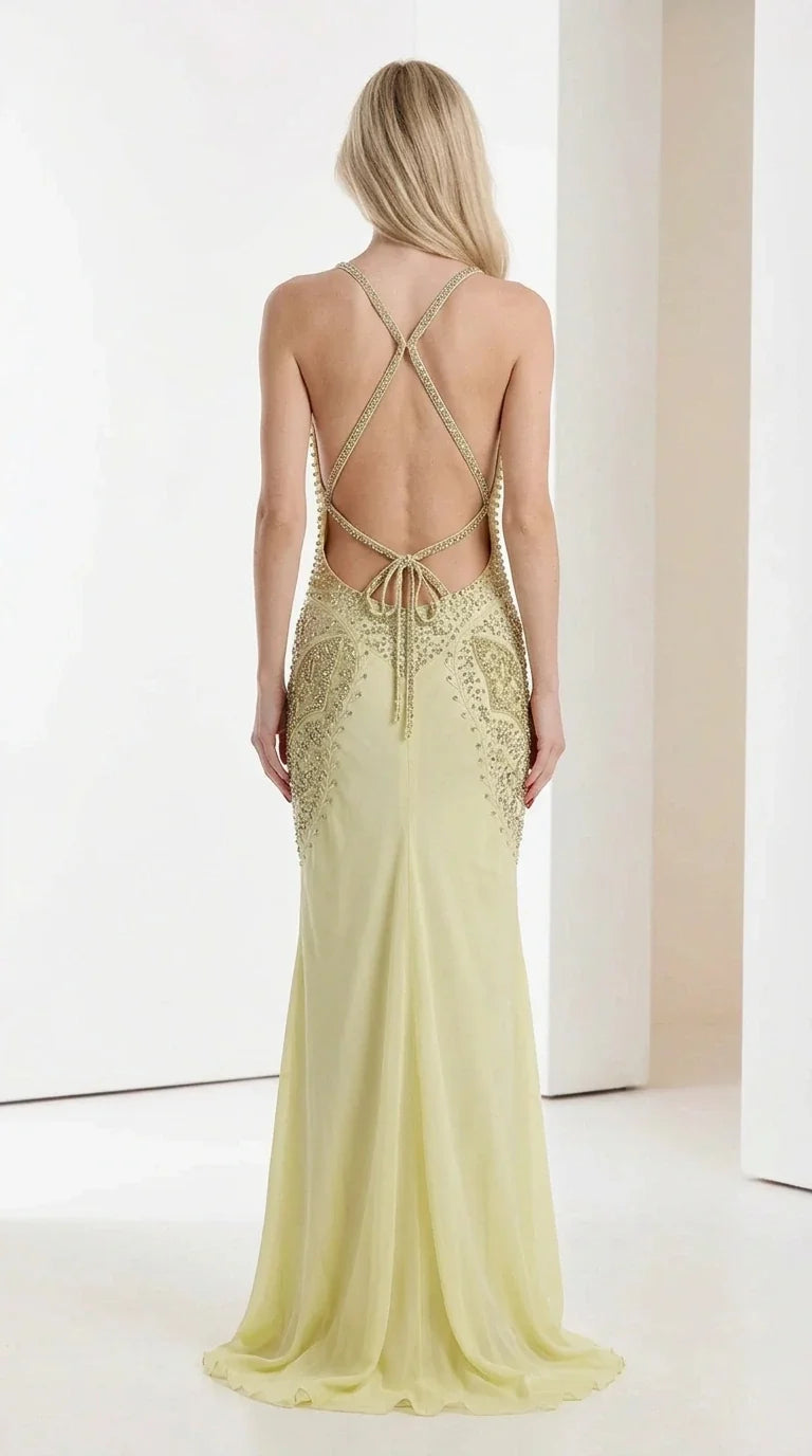 Back view showing lace-up straps on yellow maxi dress