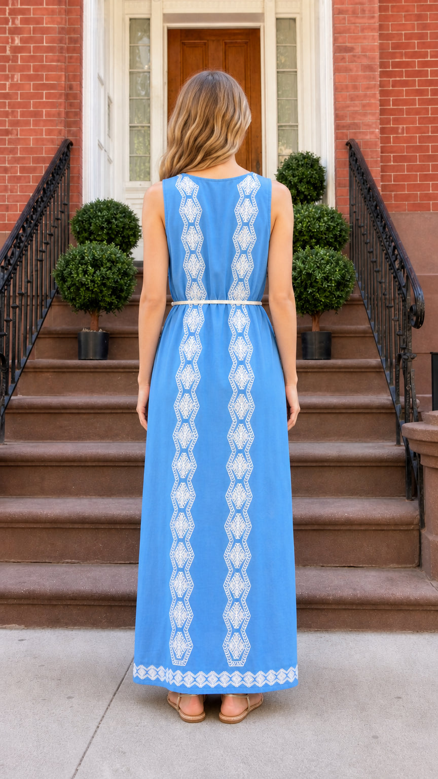 Back view of blue maxi dress highlighting vertical embroidery details
