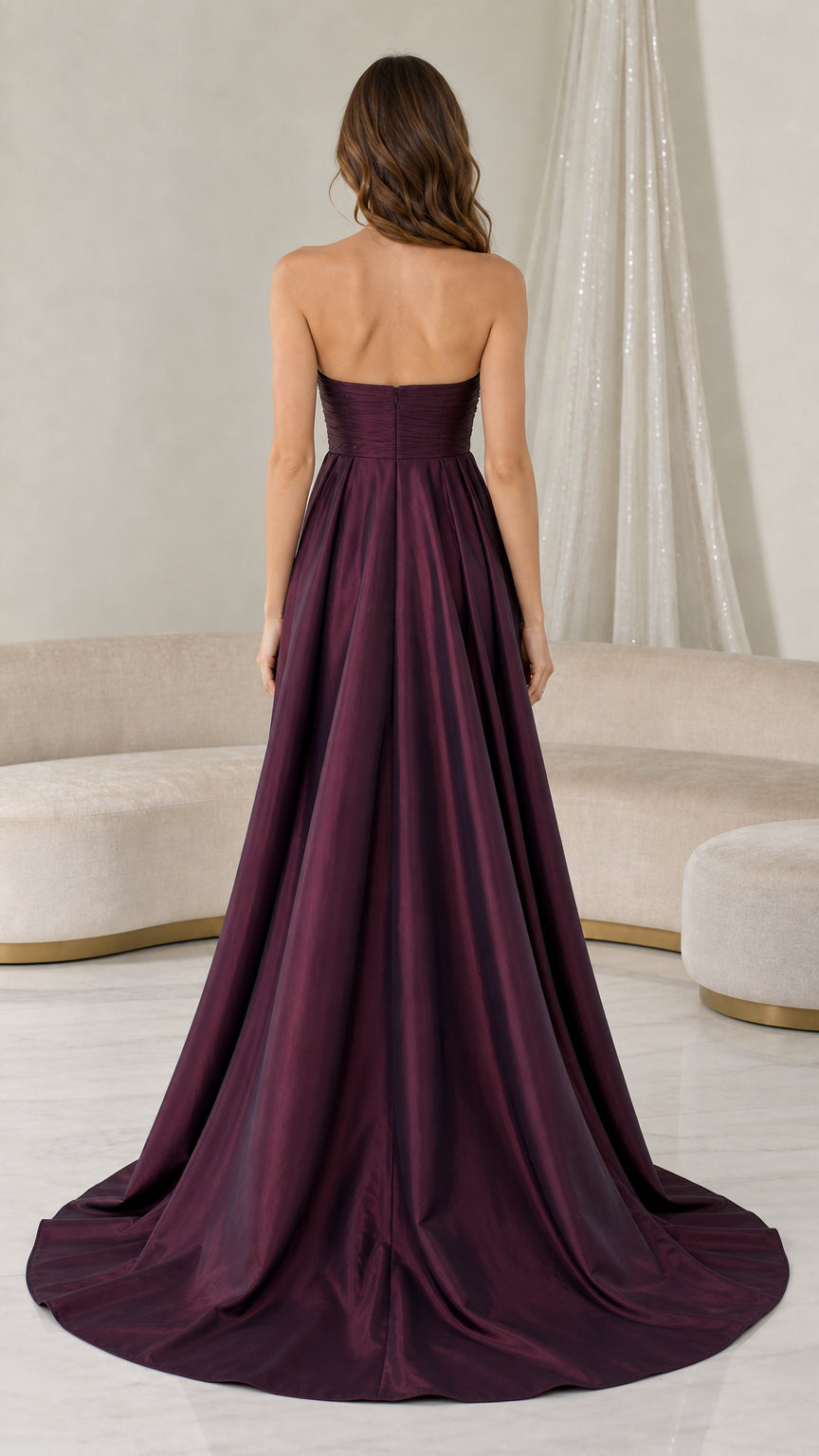 Back view of formal dress showing long train and clean lines