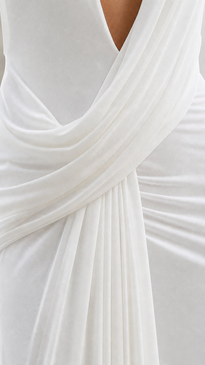 Close-up detail of the waist draping and plunging neckline