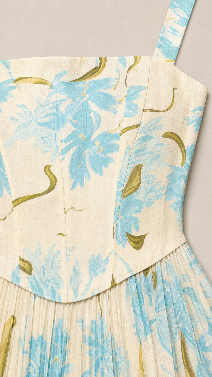 Close-up of the corset bodice and straps on ivory floral dress