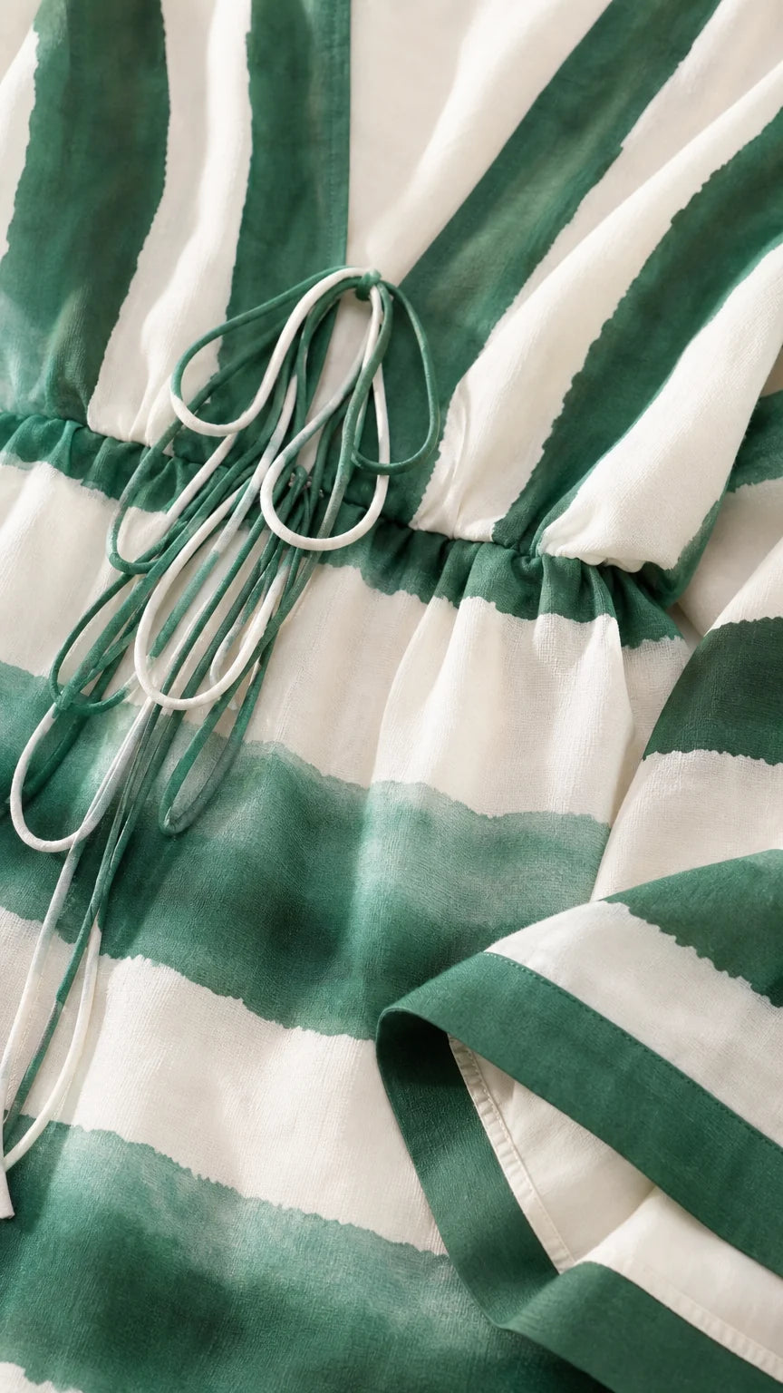 Close-up detail of drawstring waist and fabric texture