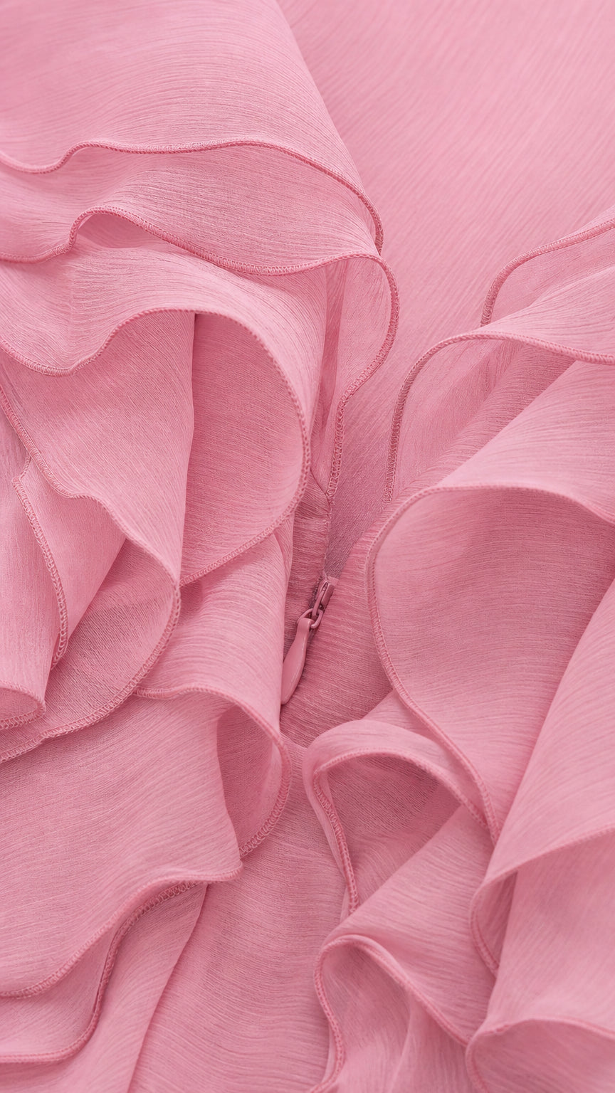 Close-up of pink layered ruffles and fabric texture
